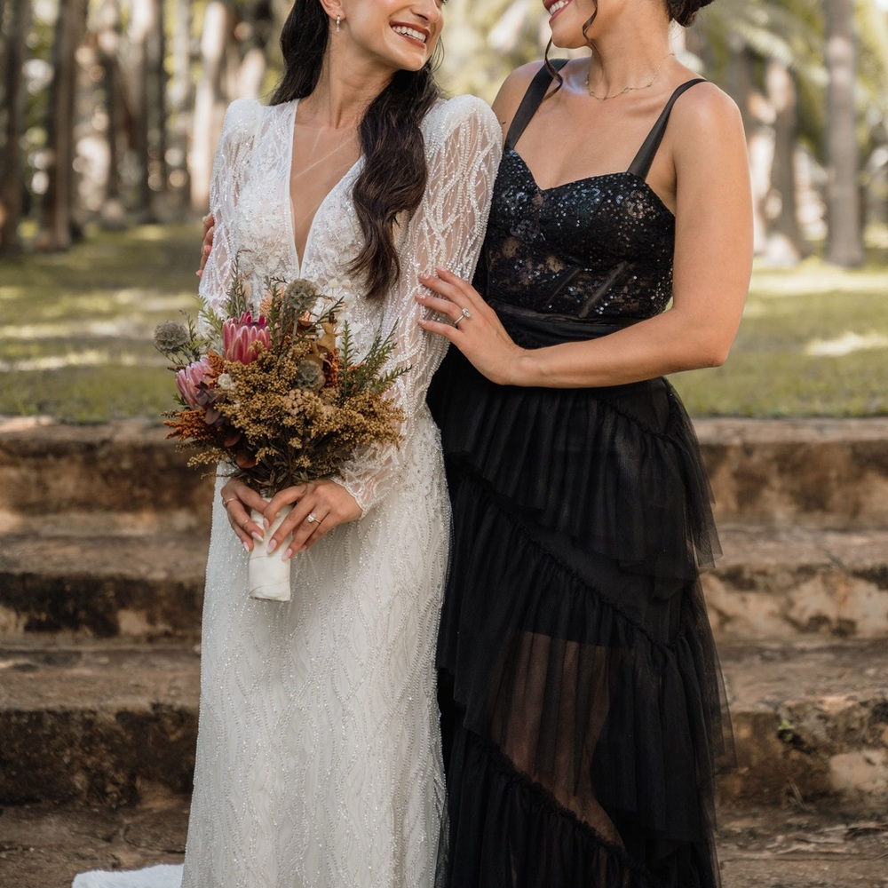 Black gown with sequins. Tulle skirt
